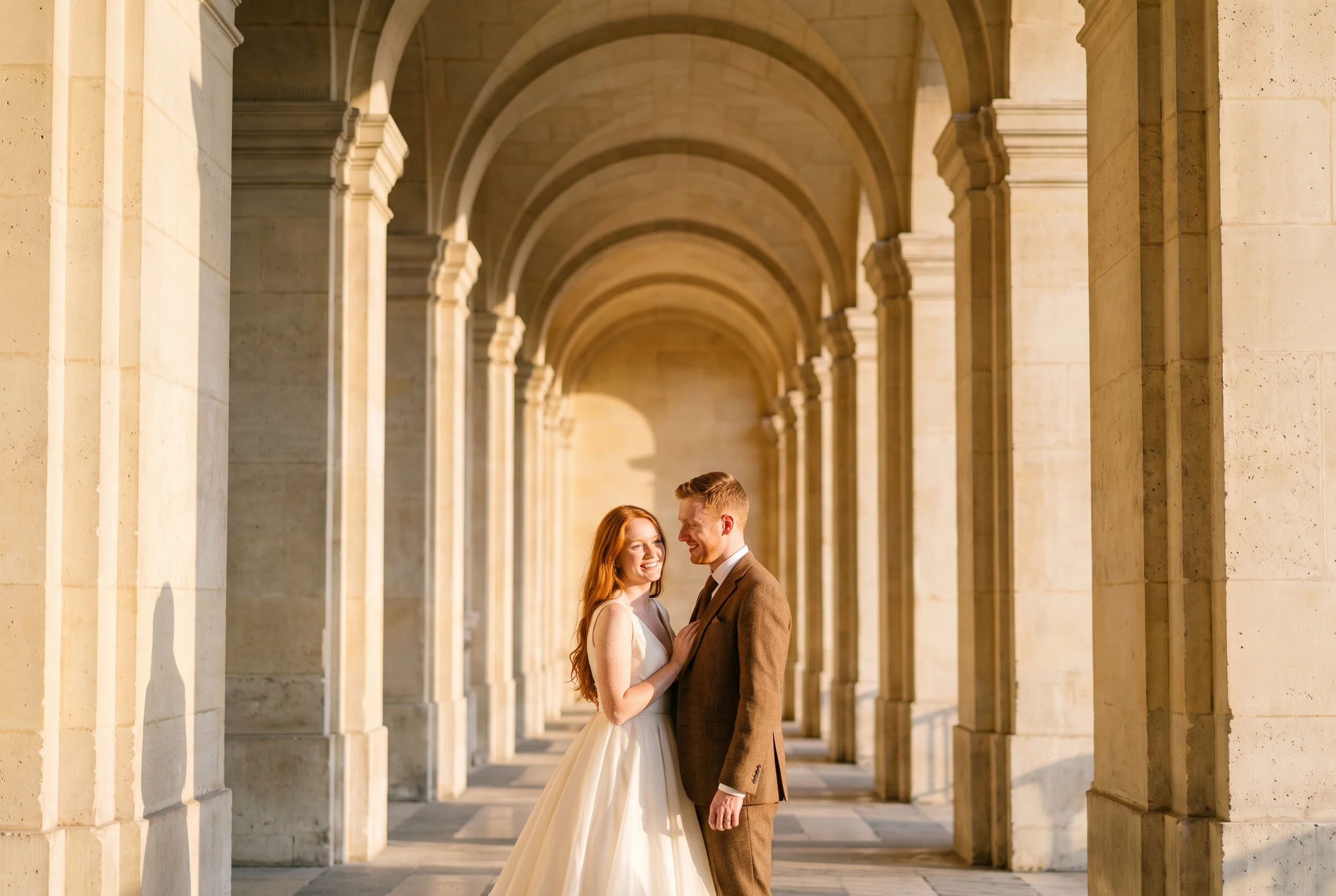 Wedding portrait at the Louvre courtyard, Paris